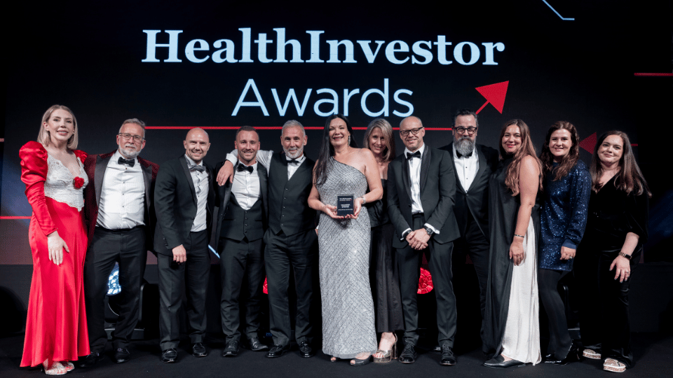 Priory team collect winning trophy at awards ceremony