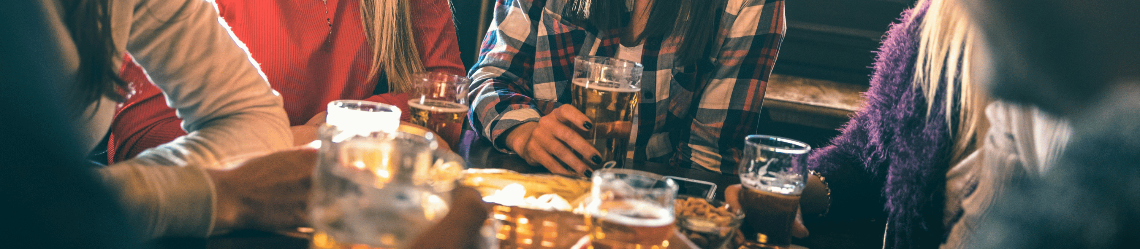 Students Drinking In A Pub
